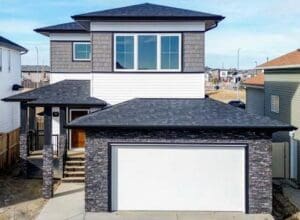 Two-story house with stone-faced double garage