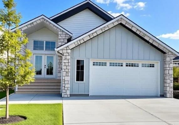 Modern home entrance flanked by young tree